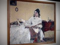 Портрет Надежды Михайловны Сапожниковой (на фоне обоев). 1916